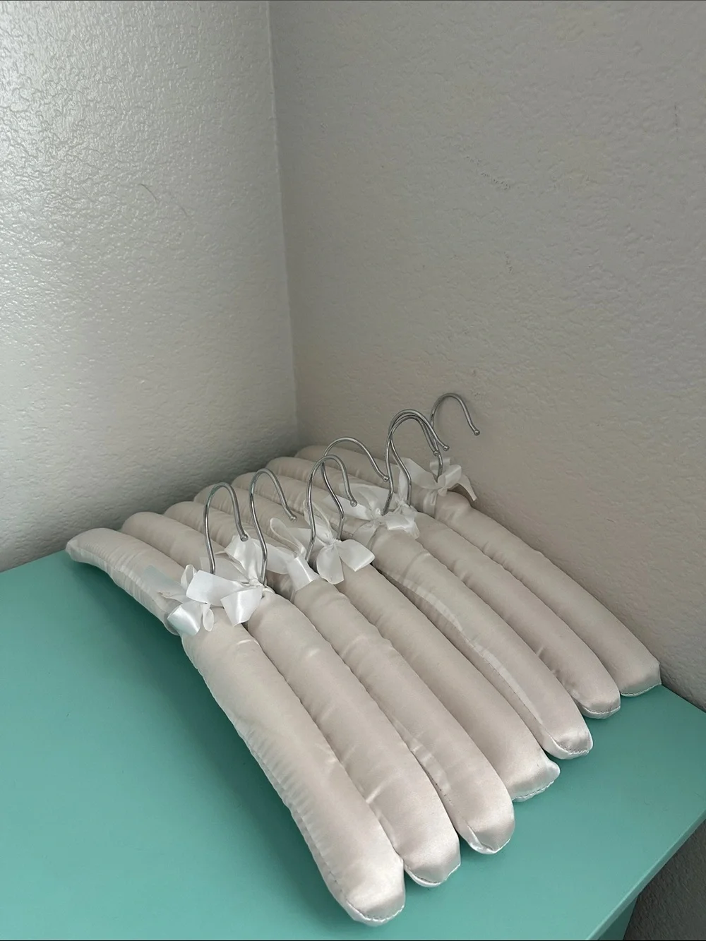 Satin white glossy padded heavy duty hangers-set of 7ct. with a bow-brand new